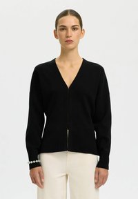 Вязаная кофта