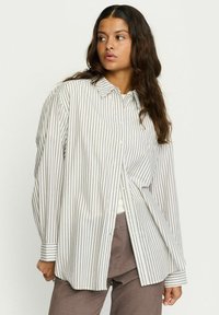 Длинная блузка Длинная блузка