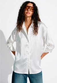 Длинная блузка