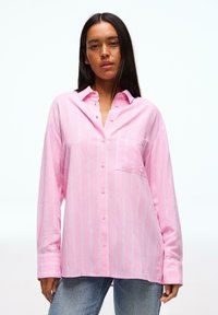 Длинная блузка