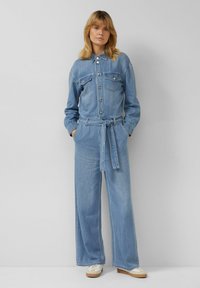 Джинсовый комбинезон Джинсовый комбинезон