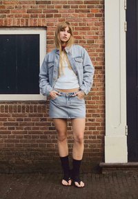 Юбка с накладными карманами