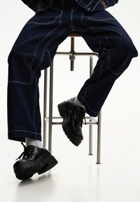 Ботинки на шнуровке