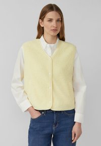 Пуховой жилет Пуховой жилет