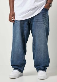 Свободные джинсы Свободные джинсы