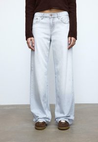 Свободные джинсы Свободные джинсы