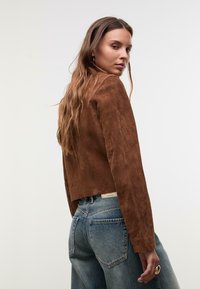 Кожаная куртка