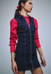 Джинсовый комбинезон Джинсовый комбинезон