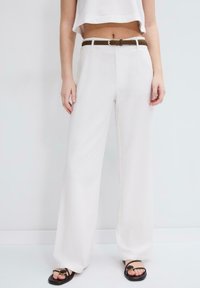 Широкие брюки Широкие брюки