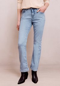 Клешеные брюки Клешеные брюки