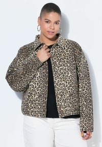 Джинсовая куртка