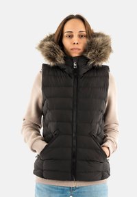 Пуховой жилет Пуховой жилет