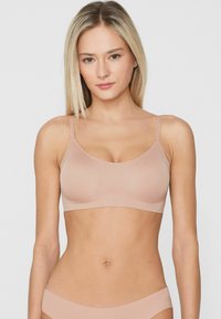 Бюстгальтер без бретелек Бюстгальтер без бретелек