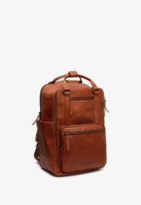 Кожаный рюкзак