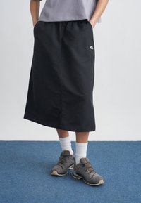 Юбка с накладными карманами Юбка с накладными карманами