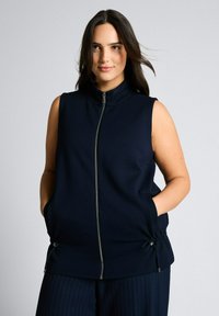 Жилет Жилет