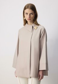 Длинная блузка