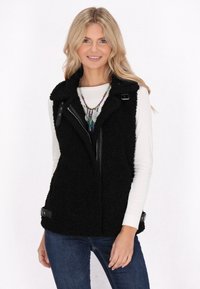 Пуховой жилет