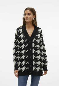 Длинный жилет Длинный жилет