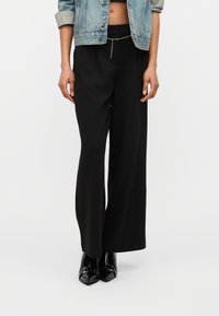 Широкие брюки Широкие брюки