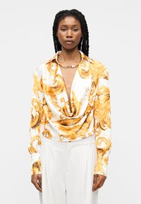 Блузка Блузка