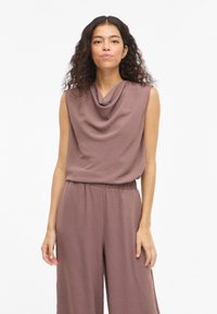 Блузка без рукавов Блузка без рукавов