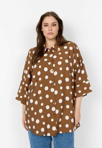 Длинная блузка