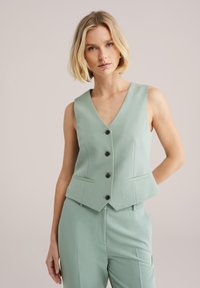 Жилет Жилет