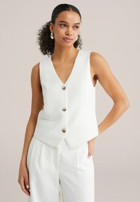 Жилет Жилет