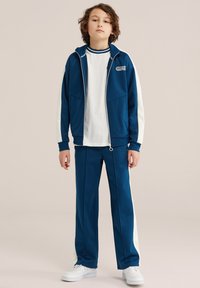 Брюки Брюки