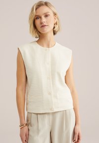 Жилет Жилет