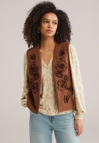 Жилет Жилет