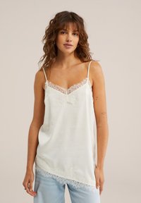 Длинный топ