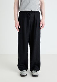 Льняные брюки