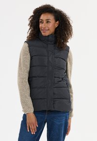 Стеганый жилет Стеганый жилет