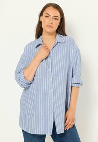 Длинная блузка Длинная блузка