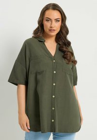 Длинная блузка Длинная блузка