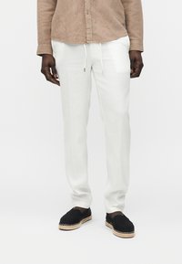 Льняные брюки