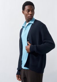 Вязаная кофта