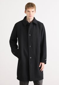 Шерстяное пальто