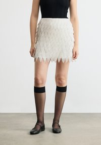 Мини-юбка Мини-юбка