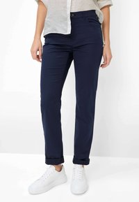 Узкие брюки Узкие брюки