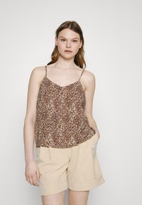 Топ на бретельках