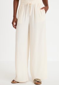 Широкие брюки Широкие брюки