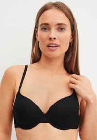 Бюстгальтер на косточках