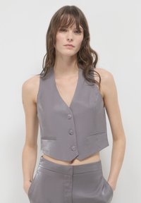 Жилет Жилет