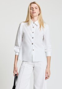 Атласная блузка