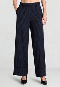 Широкие брюки Широкие брюки