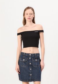 Топ без бретелек