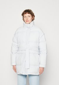 Пуховой жилет Пуховой жилет